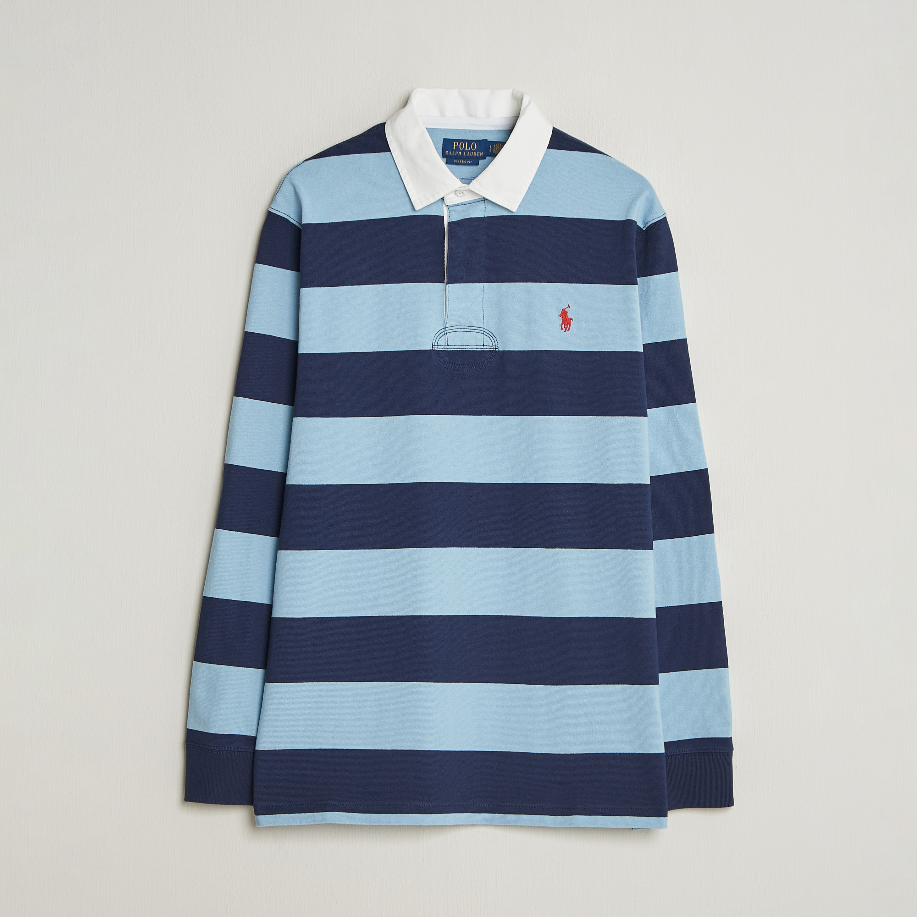 Polo Ralph Lauren Jersey Striped Rugger Powder Blue/Newport Navy en CareOfC