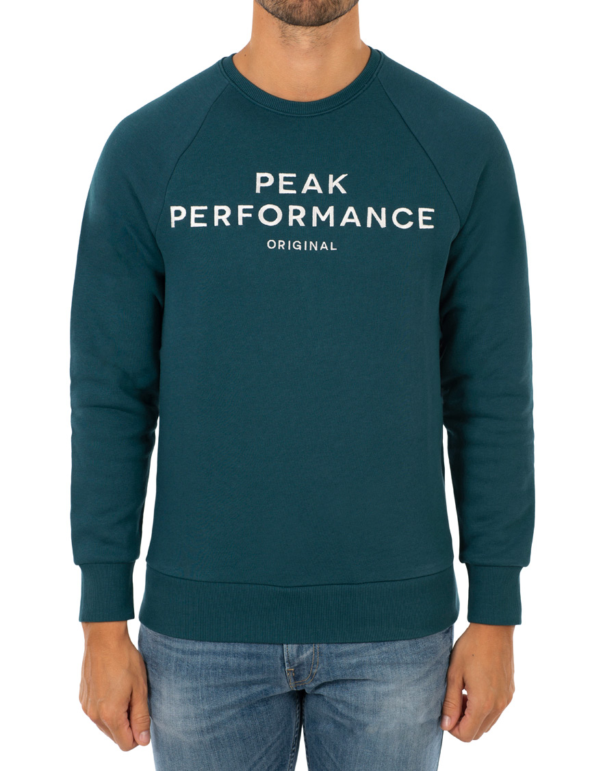 Hombres | Jerséis y prendas de punto | Peak Performance | Logo Crew Neck Sweatshirt Teal Extreme