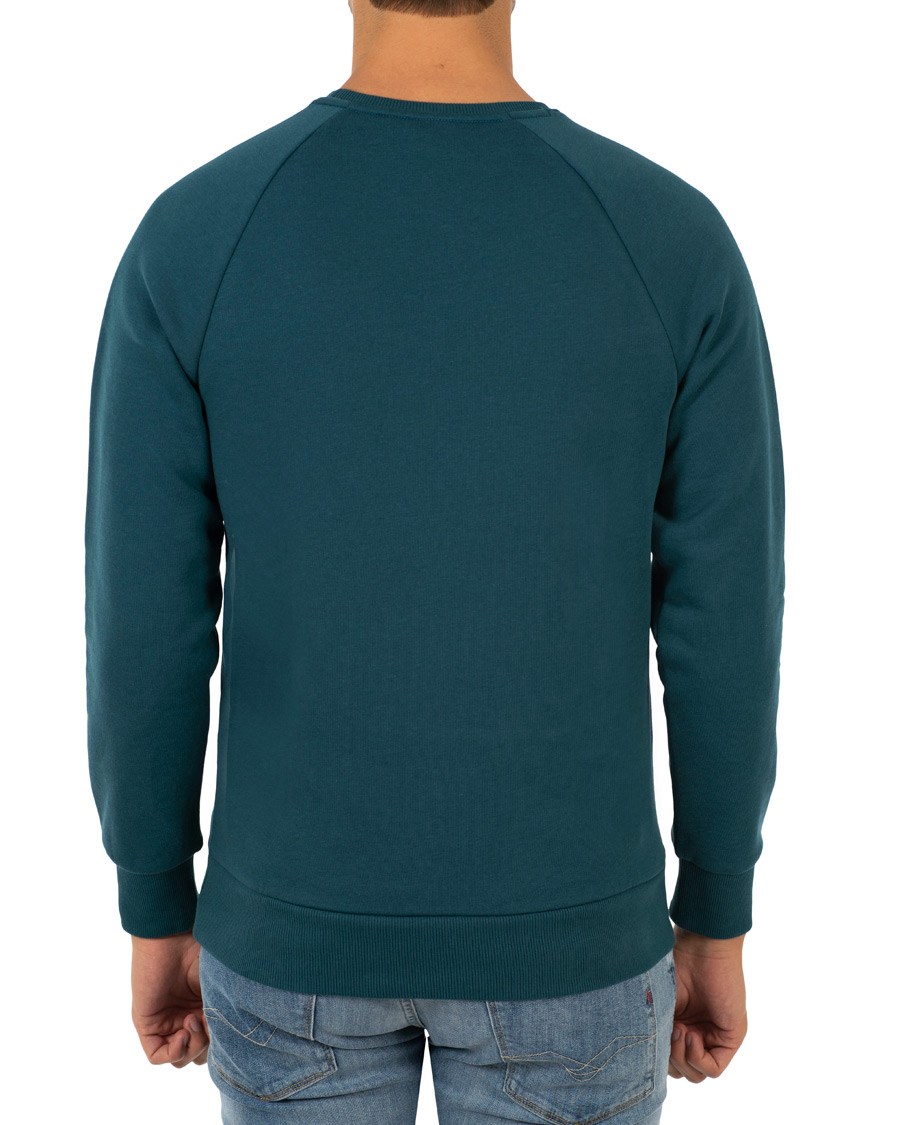Hombres | Jerséis y prendas de punto | Peak Performance | Logo Crew Neck Sweatshirt Teal Extreme