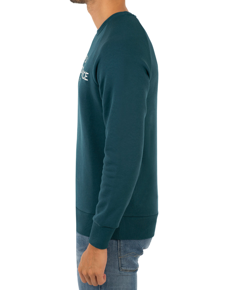 Hombres | Jerséis y prendas de punto | Peak Performance | Logo Crew Neck Sweatshirt Teal Extreme