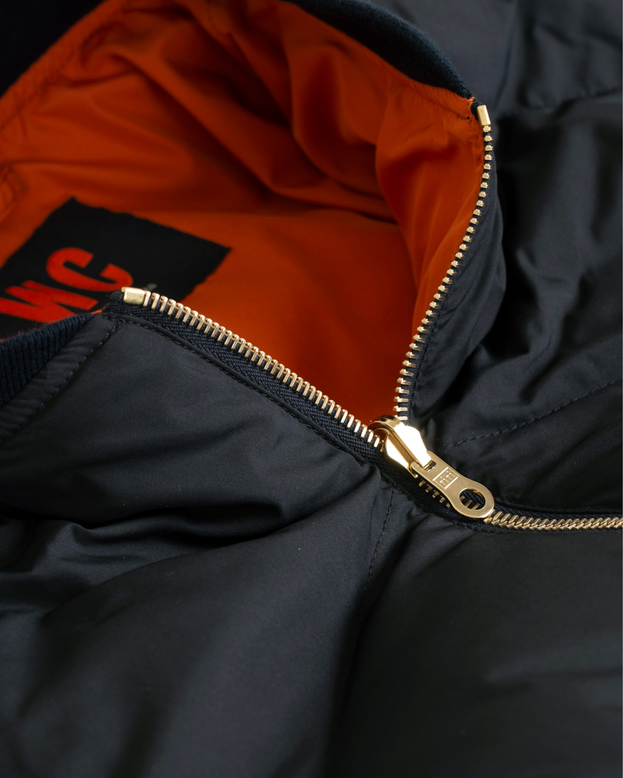 Hombres | Abrigos y chaquetas | The Workers Club | Reversible Down Filled Bomber Navy/Orange