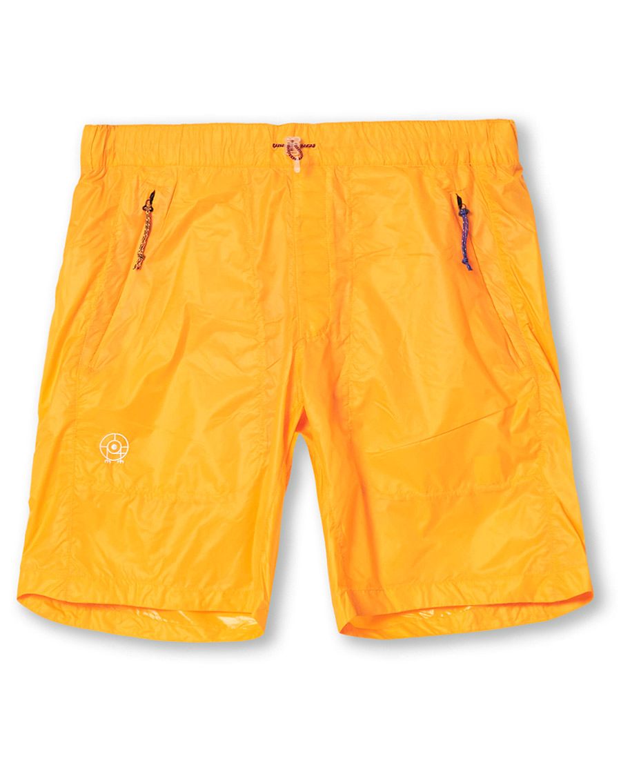 Hombres | Pantalones cortos | Peak Performance | Ben Gorham Windbreaker Shorts Orange