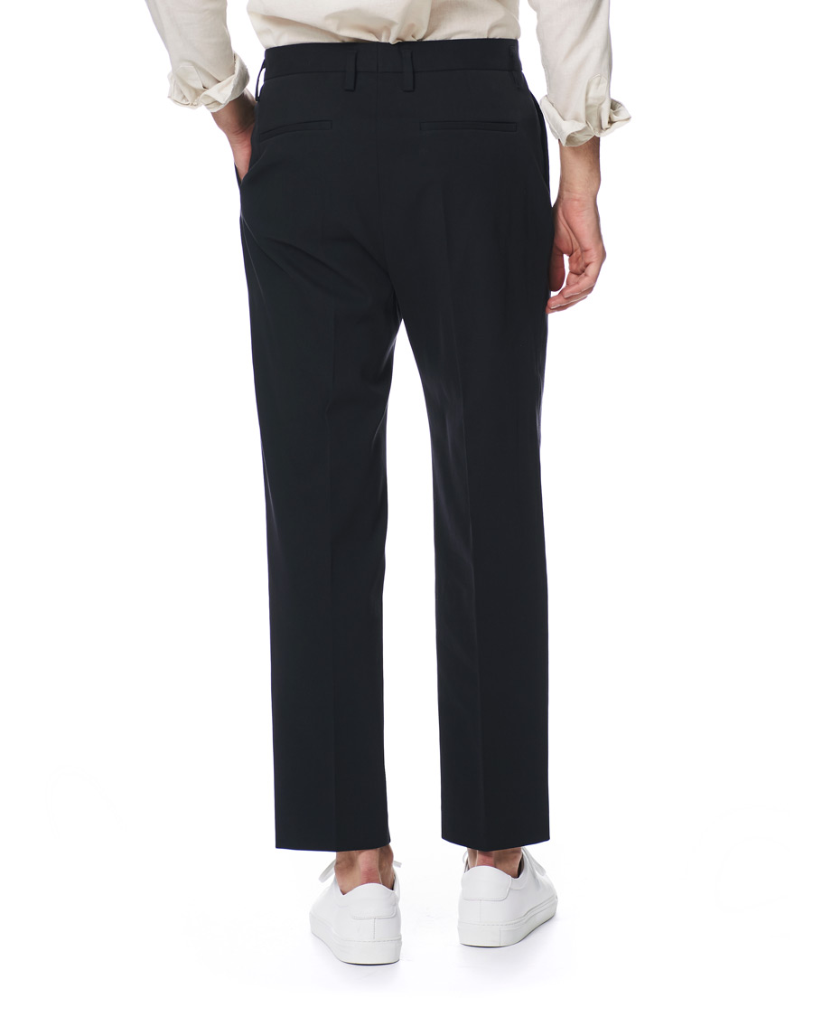 Hombres | Pantalones | Filippa K | Samson Loose Fit Pleated Cotton Trousers Navy