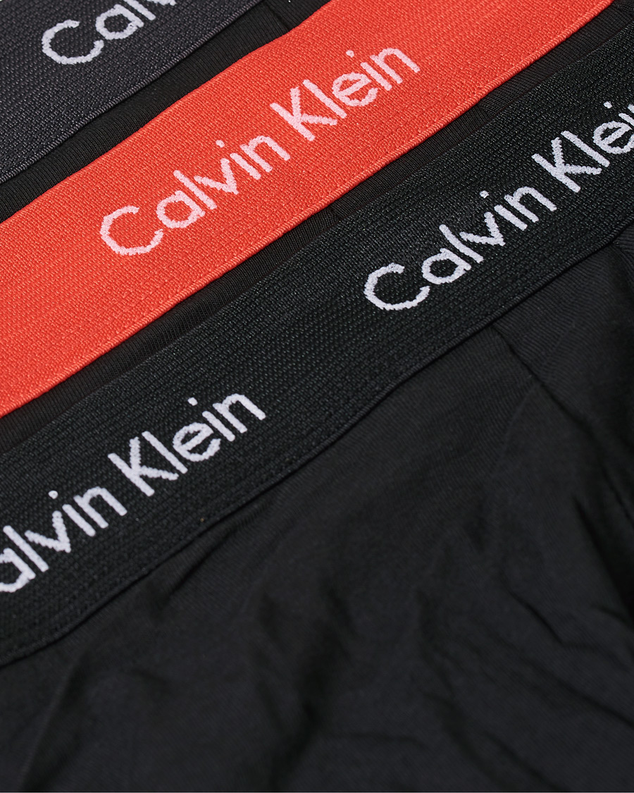 Hombres | Ropa interior y calcetines | Calvin Klein | Cotton Stretch 3-Pack Low Rise Trunk Black/Coral/Grey