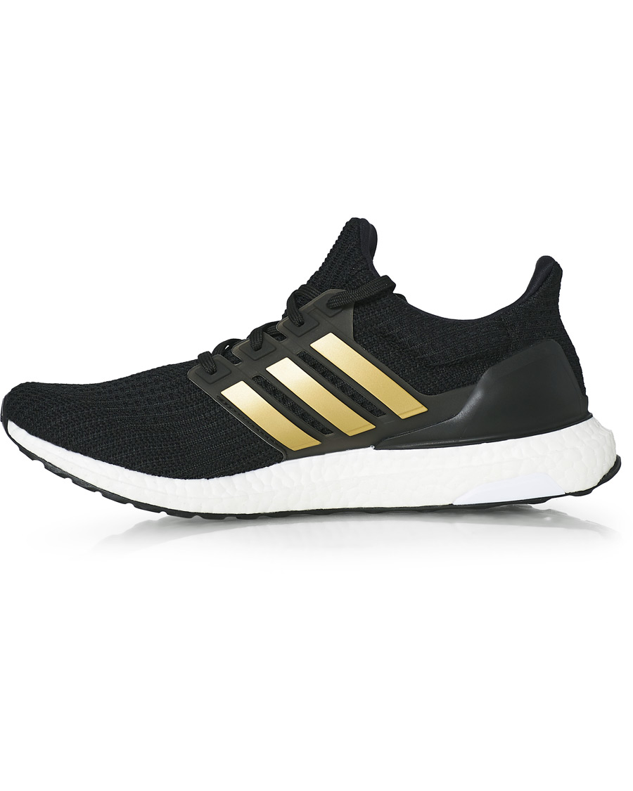 Hombres | adidas Performance Ultraboost 4.0 DNA Sneaker Core Black/Gold | adidas Performance | Ultraboost 4.0 DNA Sneaker Core Black/Gold