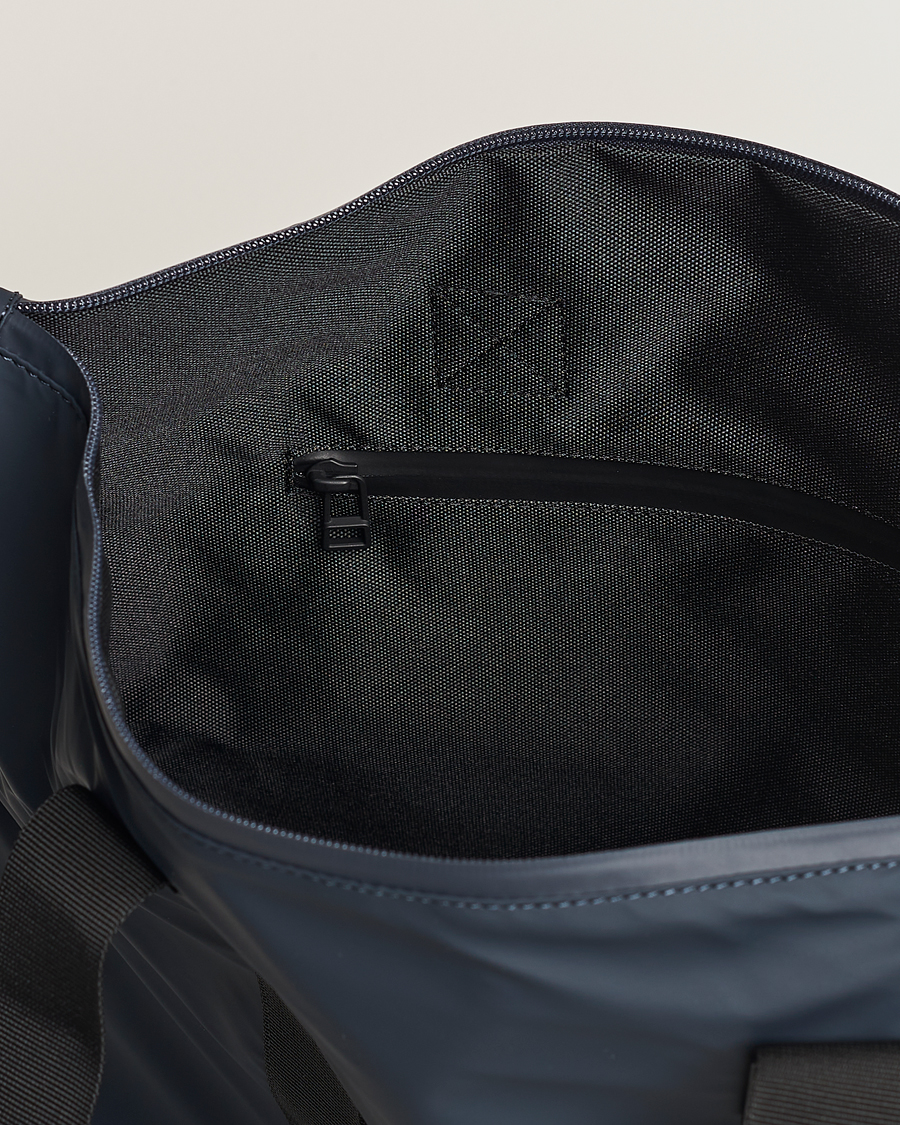Hombres | RAINS Tote Bag Rush Navy | RAINS | Tote Bag Rush Navy