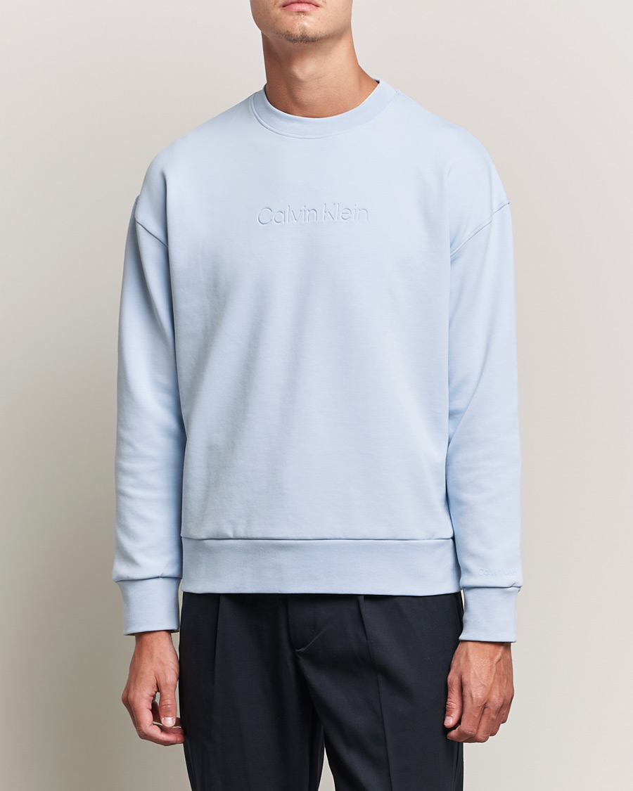 Hombres | Jerséis y prendas de punto | Calvin Klein | Debossed Logo Crew Neck Sweatshirt Bayshore Blue