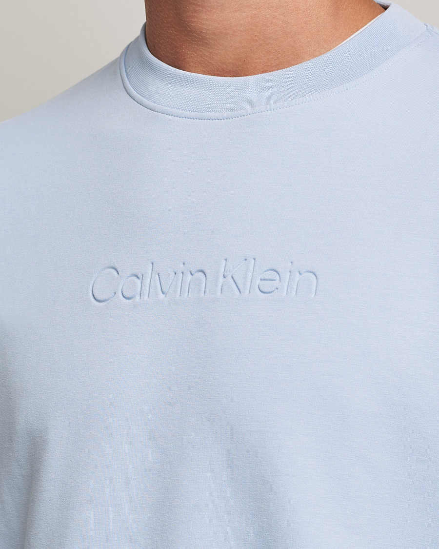 Hombres | Jerséis y prendas de punto | Calvin Klein | Debossed Logo Crew Neck Sweatshirt Bayshore Blue