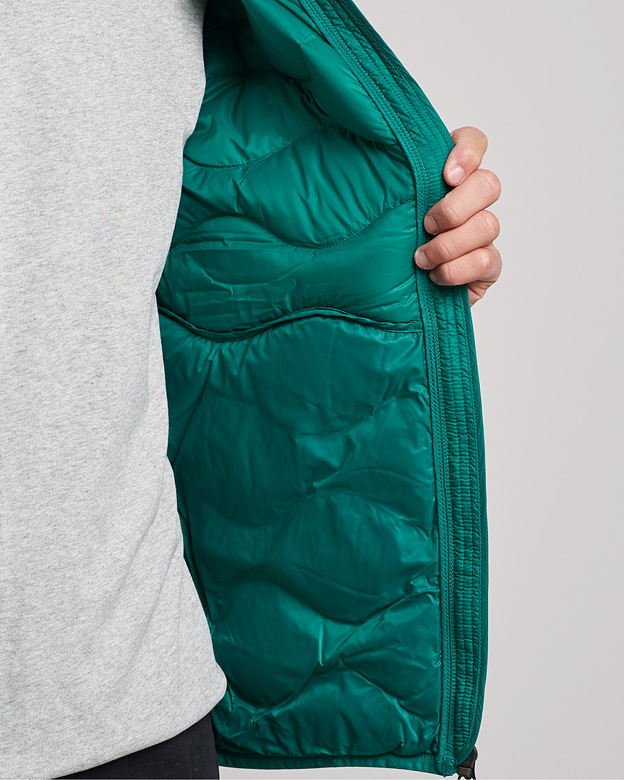 Hombres | Abrigos y chaquetas | Peak Performance | Helium Down Hood Green Ivy