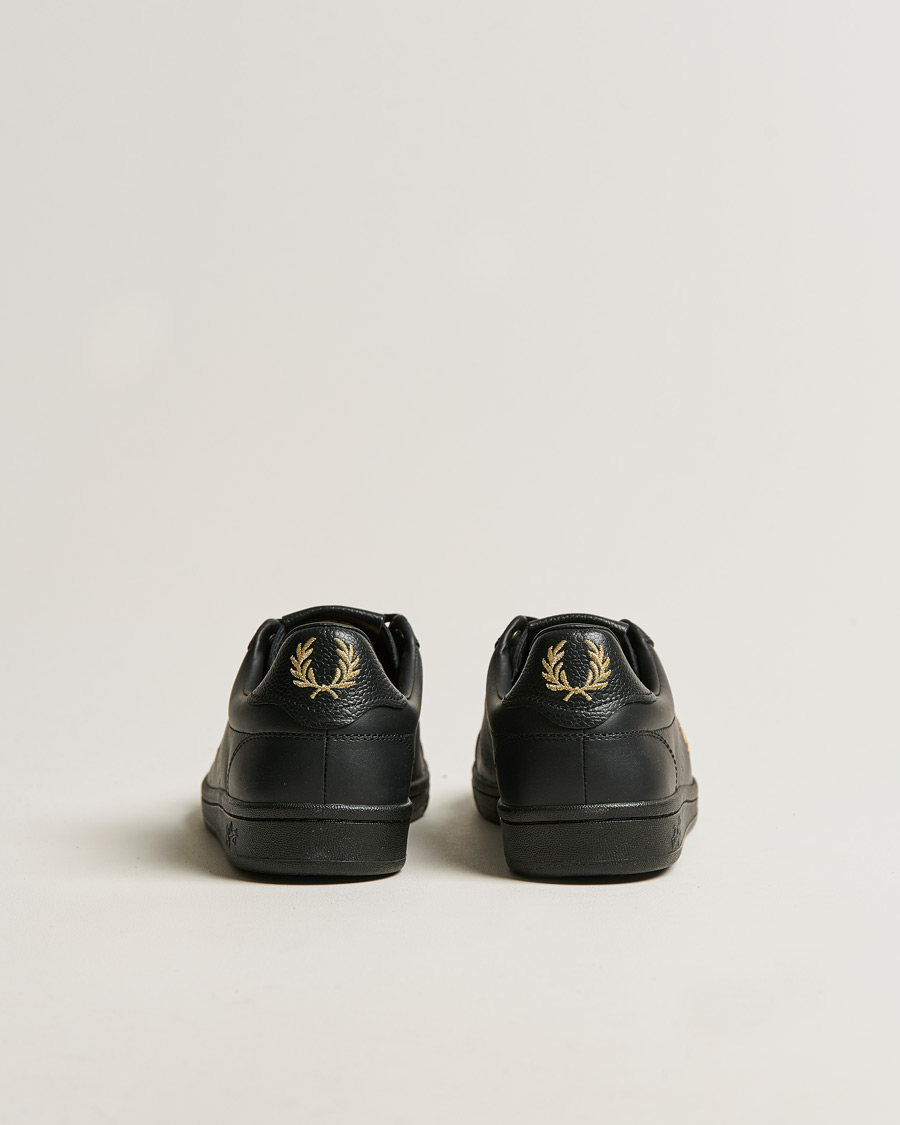 Hombres | Fred Perry B721 Leather Tab Sneaker Black Gold | Fred Perry | B721 Leather Tab Sneaker Black Gold