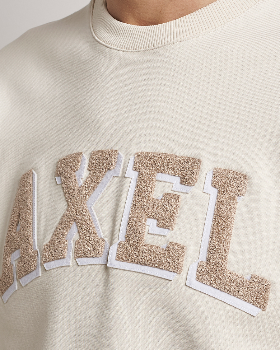 Hombres | Jerséis y prendas de punto | Axel Arigato | Axel Arc Sweatshirt Pale Beige