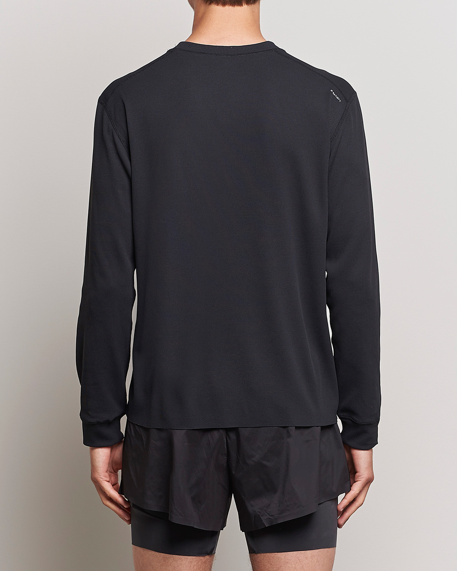 Hombres | Camisetas | Satisfy | Aura3D Base Layer Black