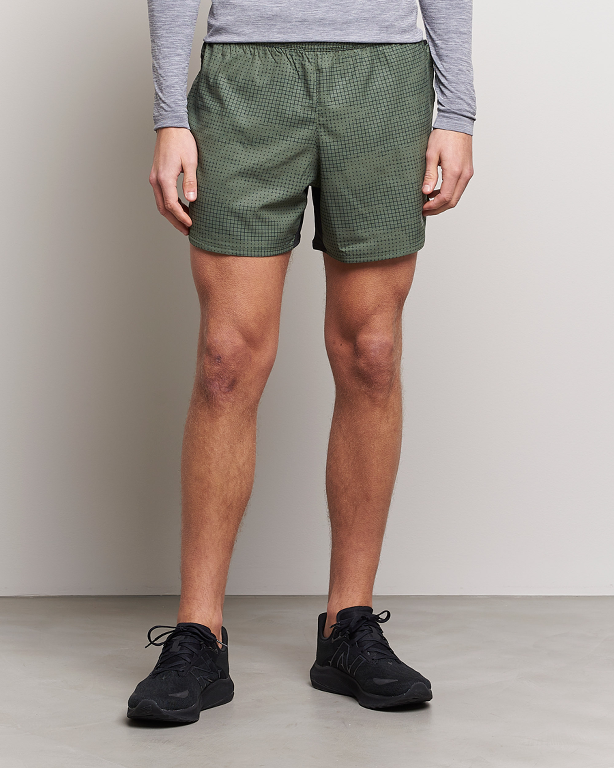 Hombres | Pantalones cortos | New Balance Running | Impact Run 5 Inch Shorts Deep Olive