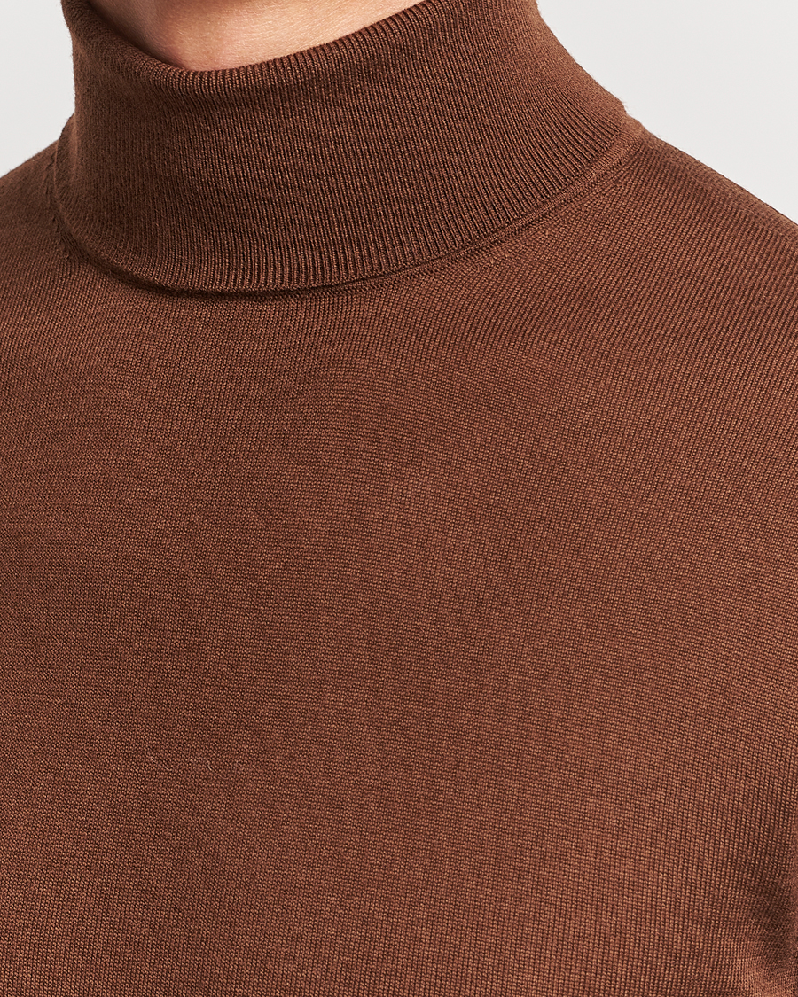Hombres | Jerséis y prendas de punto | Tiger of Sweden | Nevile Extra Fine Merino Polo Golden Copper