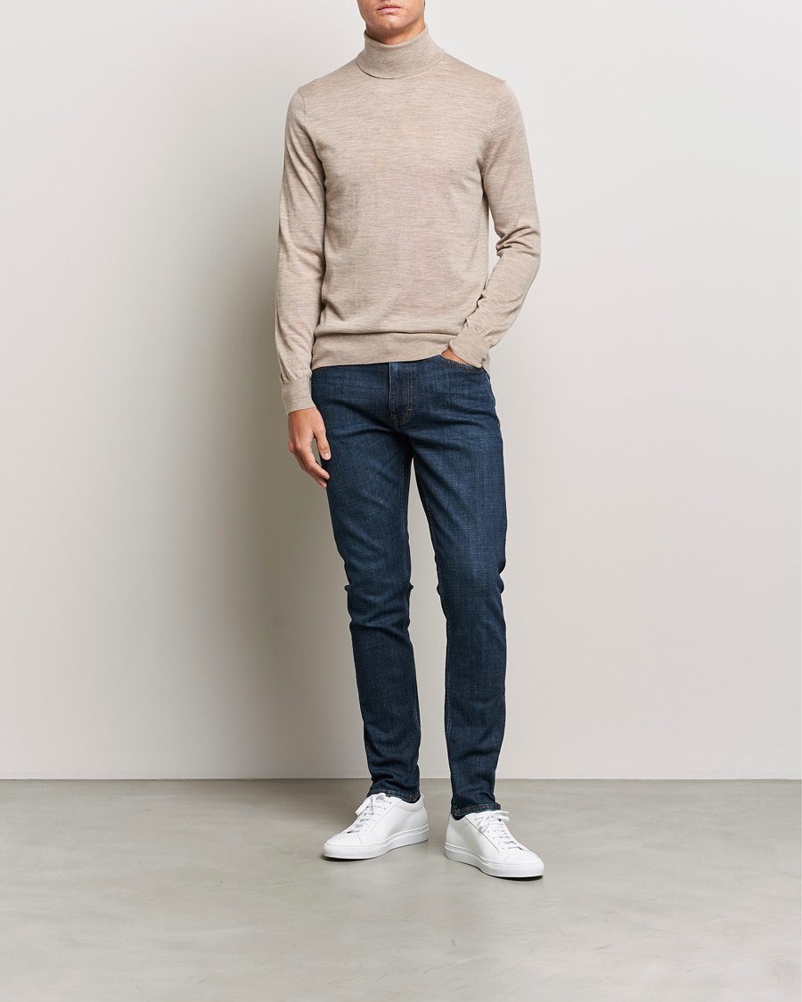 Hombres | Jerséis y prendas de punto | Tiger of Sweden | Nevile Extra Fine Merino Polo Beige Melange