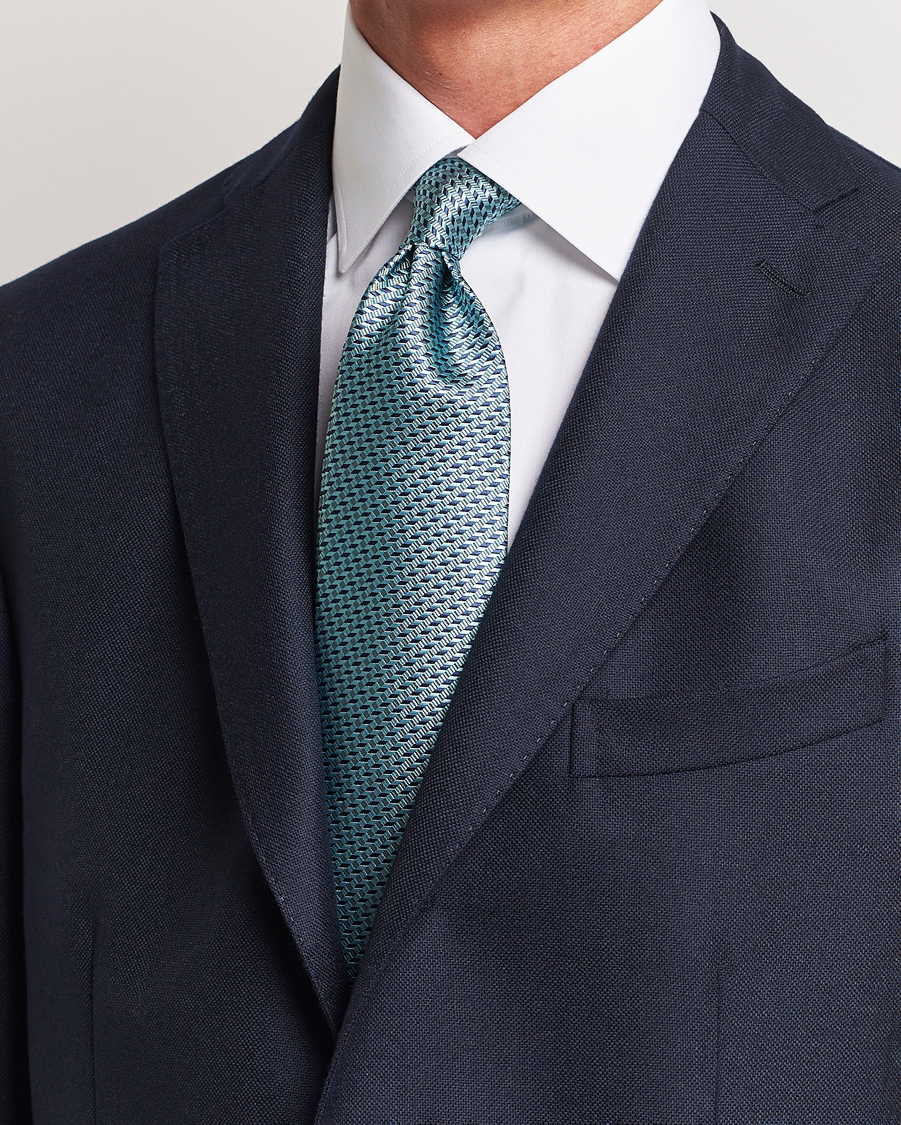 Hombres | Brioni Geometrical Jacquard Silk Tie Teal | Brioni | Geometrical Jacquard Silk Tie Teal