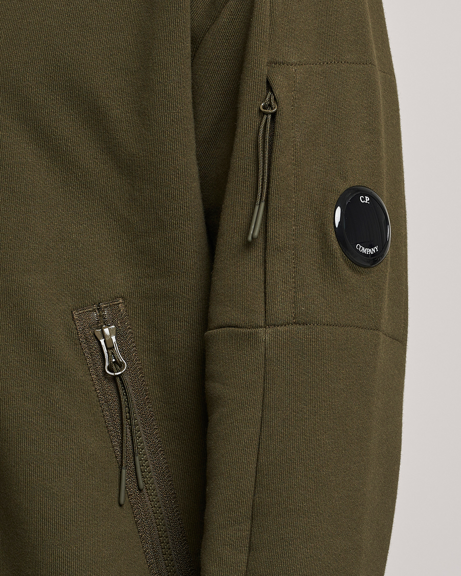 Hombres | Jerséis y prendas de punto | C.P. Company | Diagonal Raised Fleece Half Zip Lens Sweatshirt Green