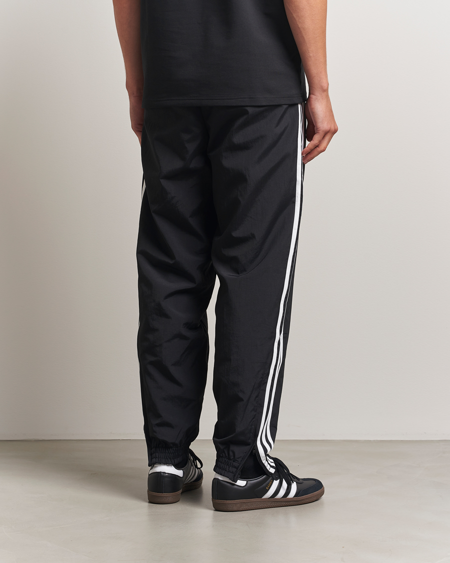 Hombres | Pantalones | adidas Originals | Firebird Track Pants Black/White