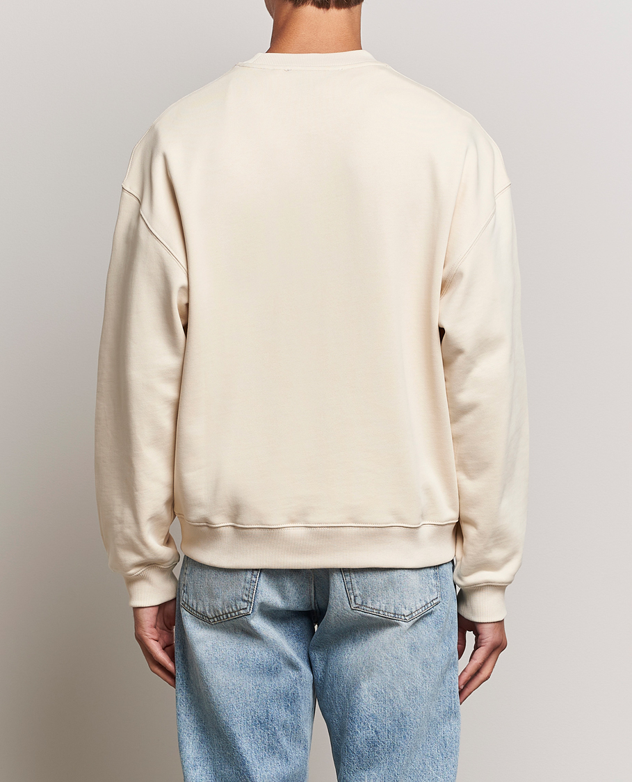 Hombres | Jerséis y prendas de punto | Axel Arigato | Honor Crew Neck Sweatshirt Pale Beige