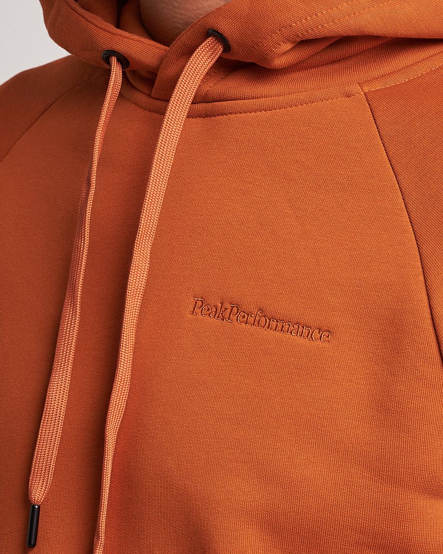 Hombres | Jerséis y prendas de punto | Peak Performance | Original Logo Hoodie Gold Flame