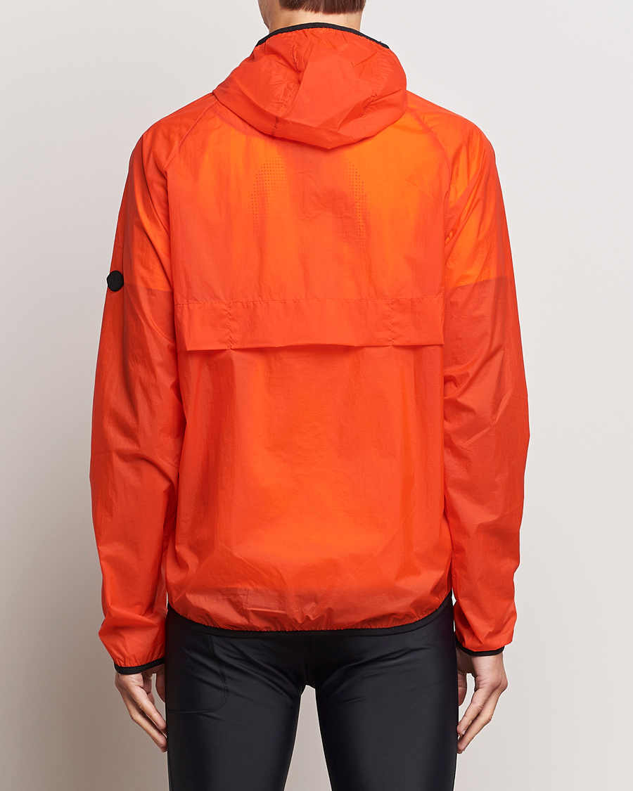 Hombres | Abrigos y chaquetas | District Vision | Ultralight Packable DWR Wind Jacket Tangerine
