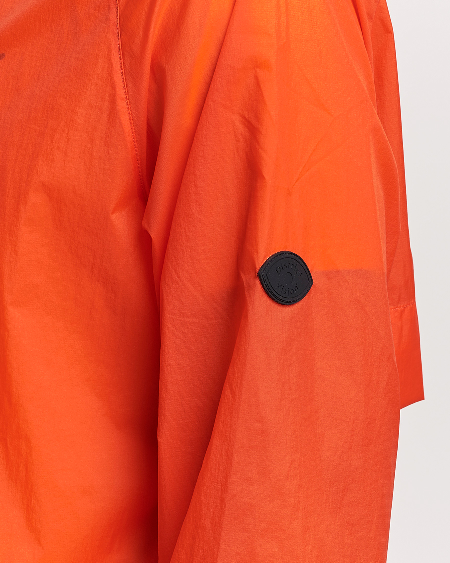 Hombres | Abrigos y chaquetas | District Vision | Ultralight Packable DWR Wind Jacket Tangerine