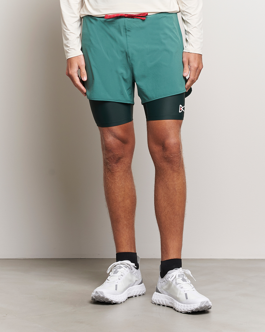 Hombres | Pantalones cortos | District Vision | Layered Pocketed Trail Shorts Pine
