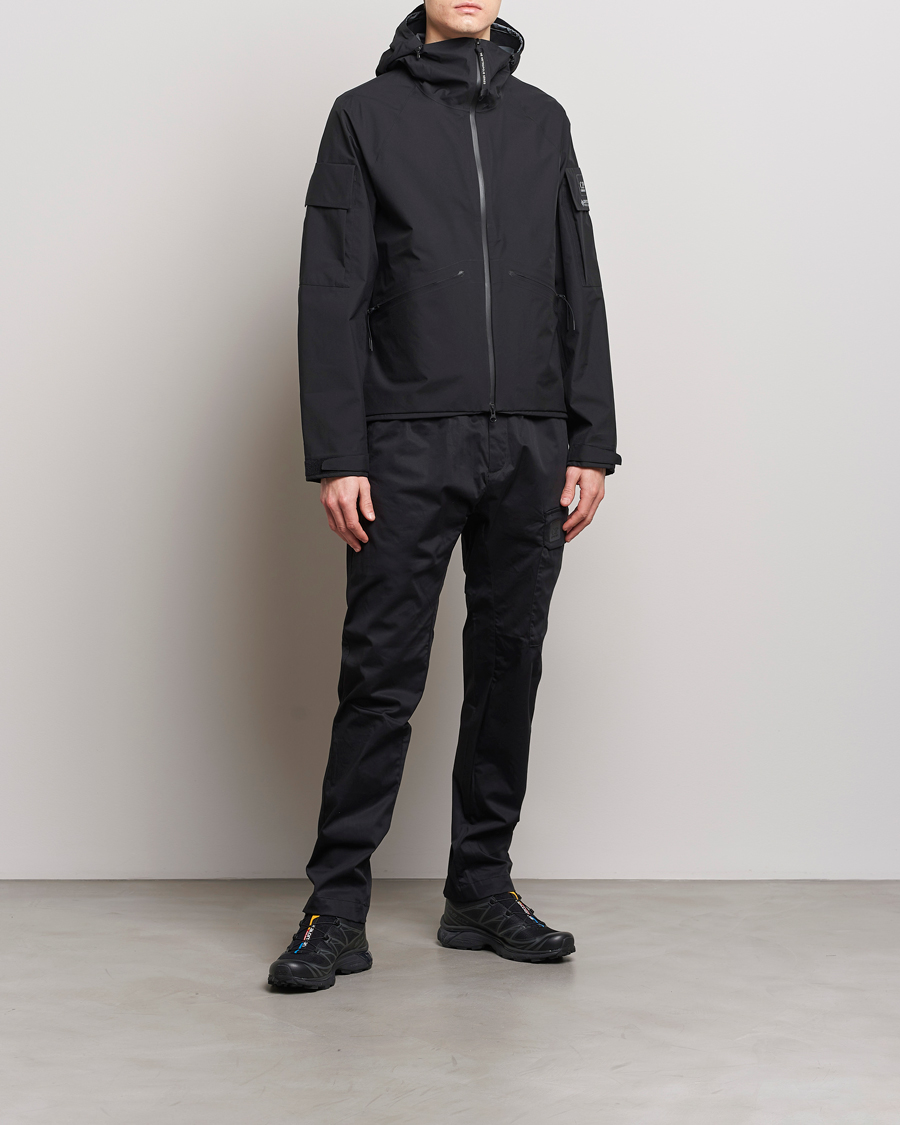 Hombres | Pantalones | C.P. Company | Metropolis Gabardine Stretch Satin Cargo Trousers Black