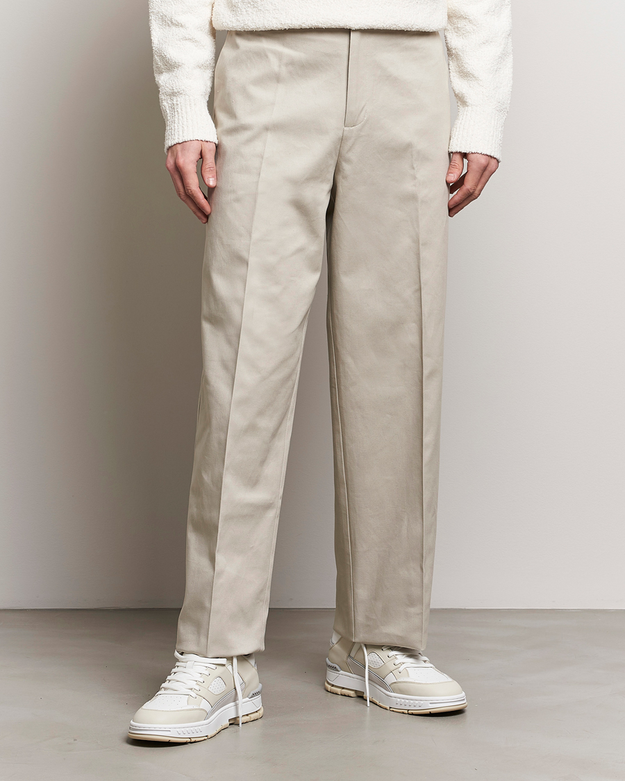 Hombres |  | Axel Arigato | Serif Relaxed Fit Trousers Pale Beige