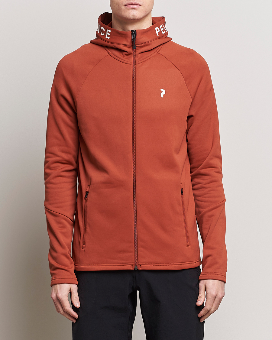 Hombres | Sudaderas con capucha | Peak Performance | Rider Hooded Full Zip Spiced