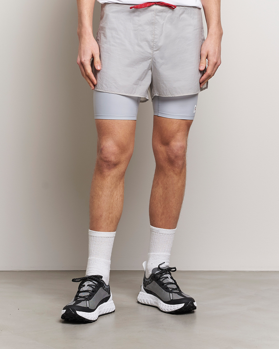 Hombres | Pantalones cortos funcionales | District Vision | Ripstop Layered Trail Shorts Moonbeam