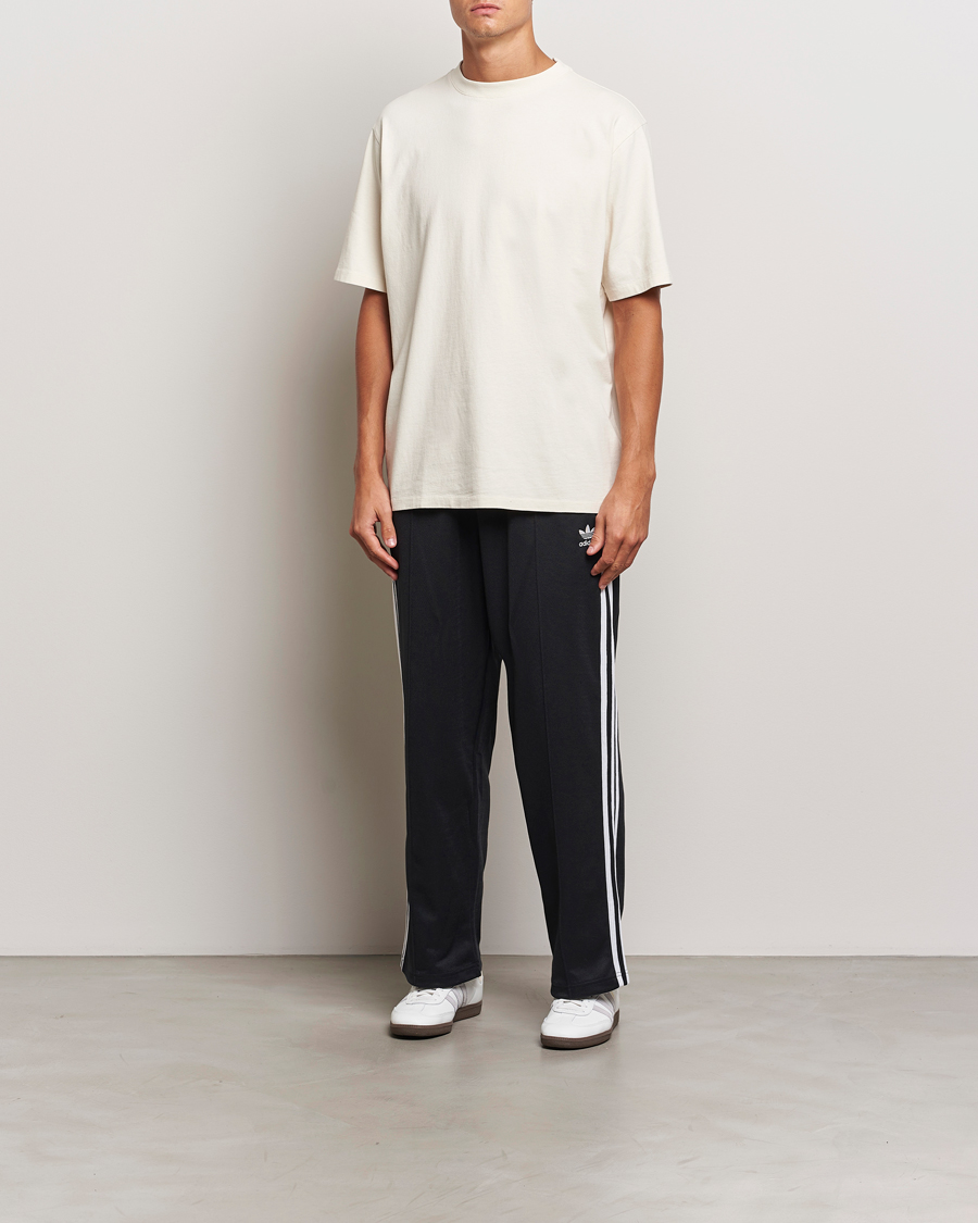 Hombres | Pantalones | adidas Originals | Firebird Baggy Pant Black