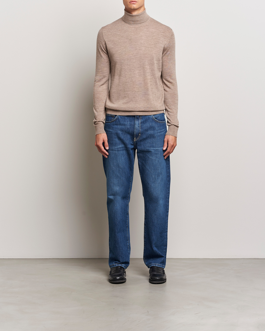 Hombres | Jerséis y prendas de punto | Tiger of Sweden | Nevile Extra Fine Merino Polo Beige Melange