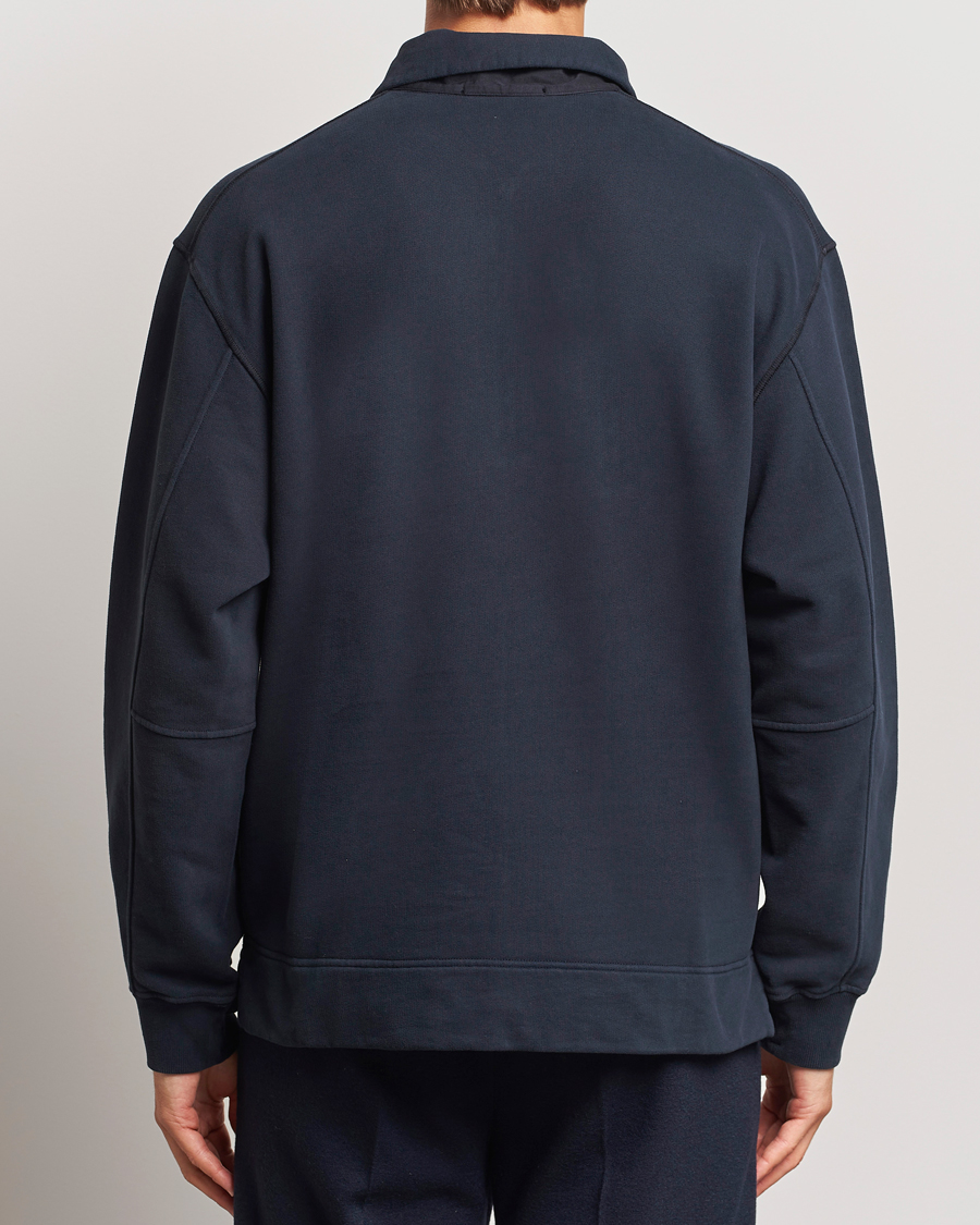 Hombres | Jerséis y prendas de punto | Stone Island | Garment Dyed Fleece Zip Polo Navy Blue