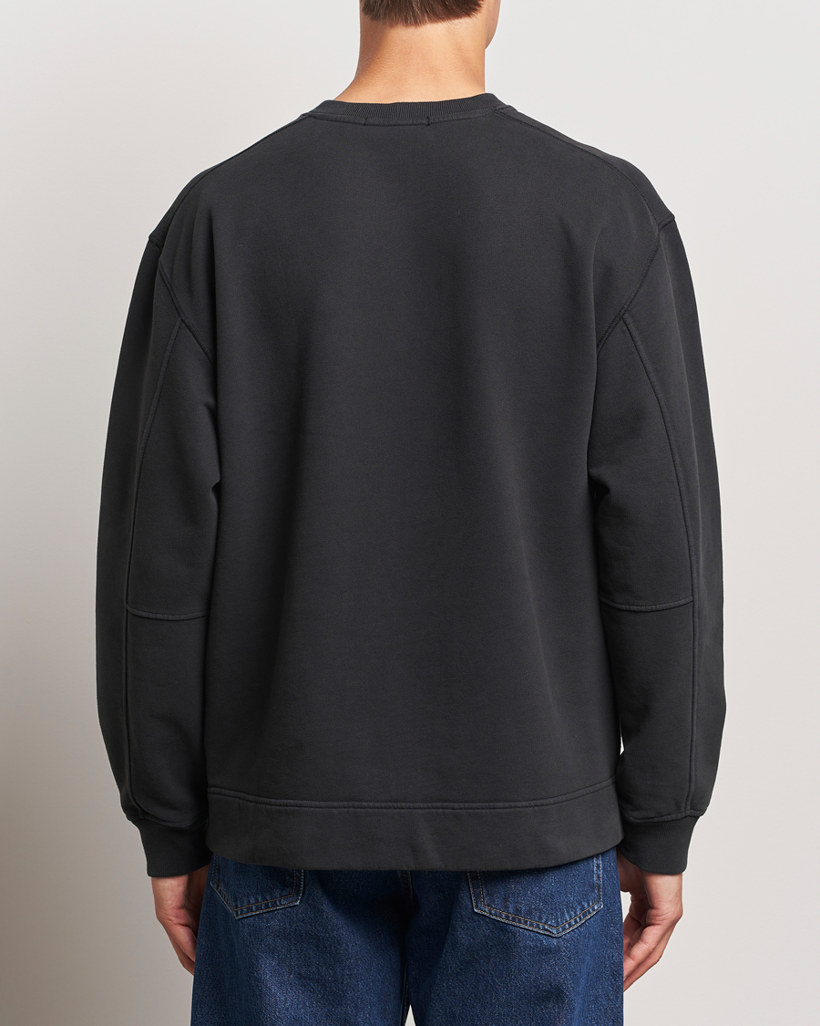 Hombres | Jerséis y prendas de punto | Stone Island | Garment Dyed Fleece Logo Sweatshirt Black