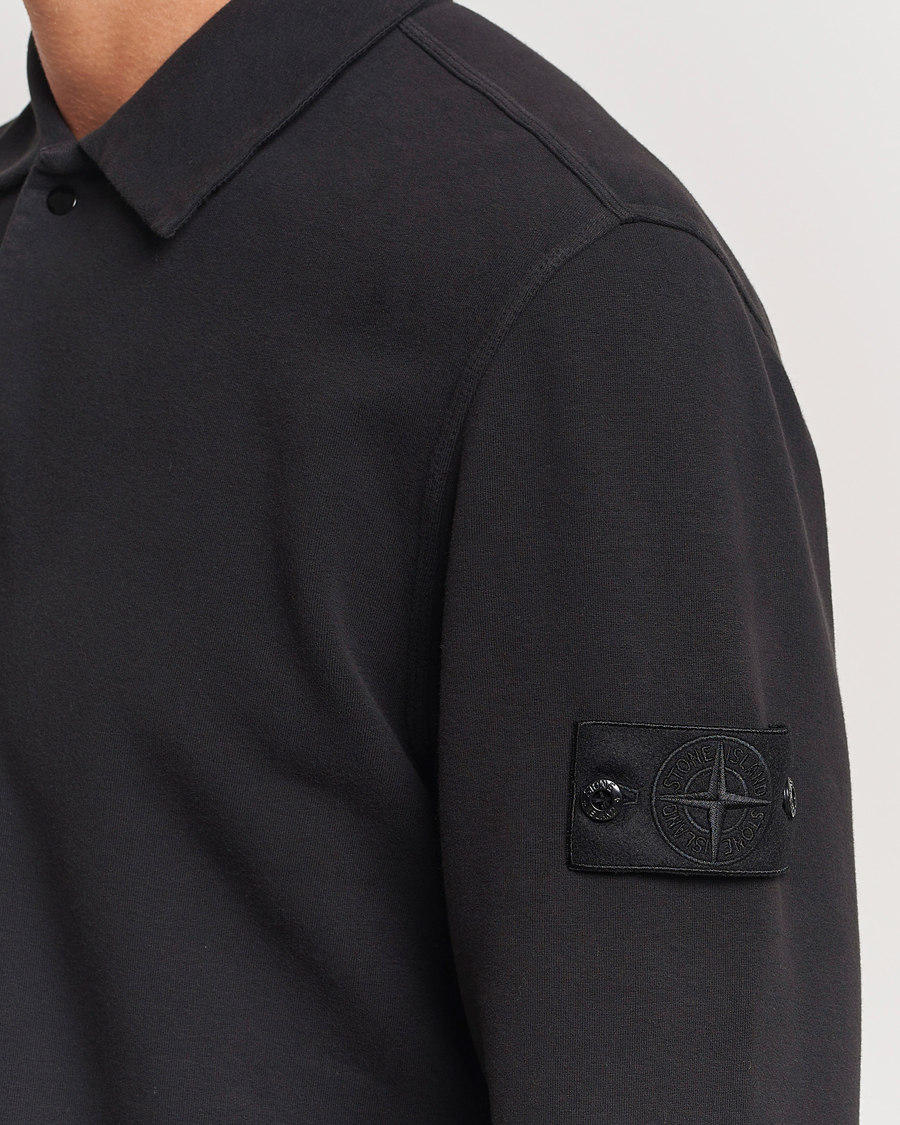 Hombres | Jerséis y prendas de punto | Stone Island | Ghost Organic Cotton Fleece Polo Sweatshirt Black