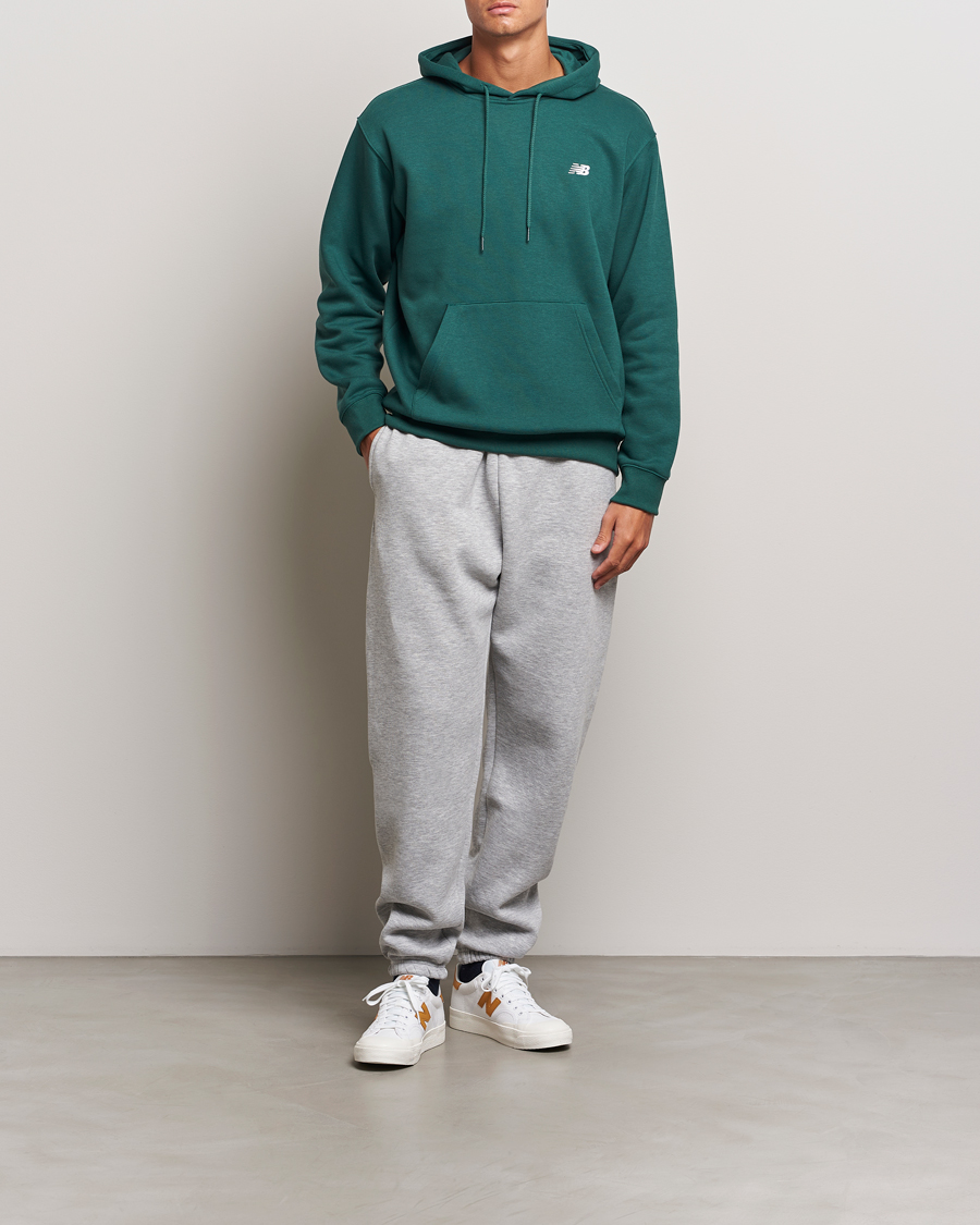 Hombres | Jerséis y prendas de punto | New Balance | Essentials Fleece Hoodie Nightwatch Green