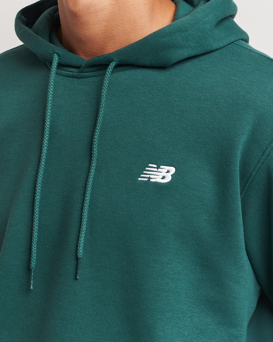 Hombres | Jerséis y prendas de punto | New Balance | Essentials Fleece Hoodie Nightwatch Green
