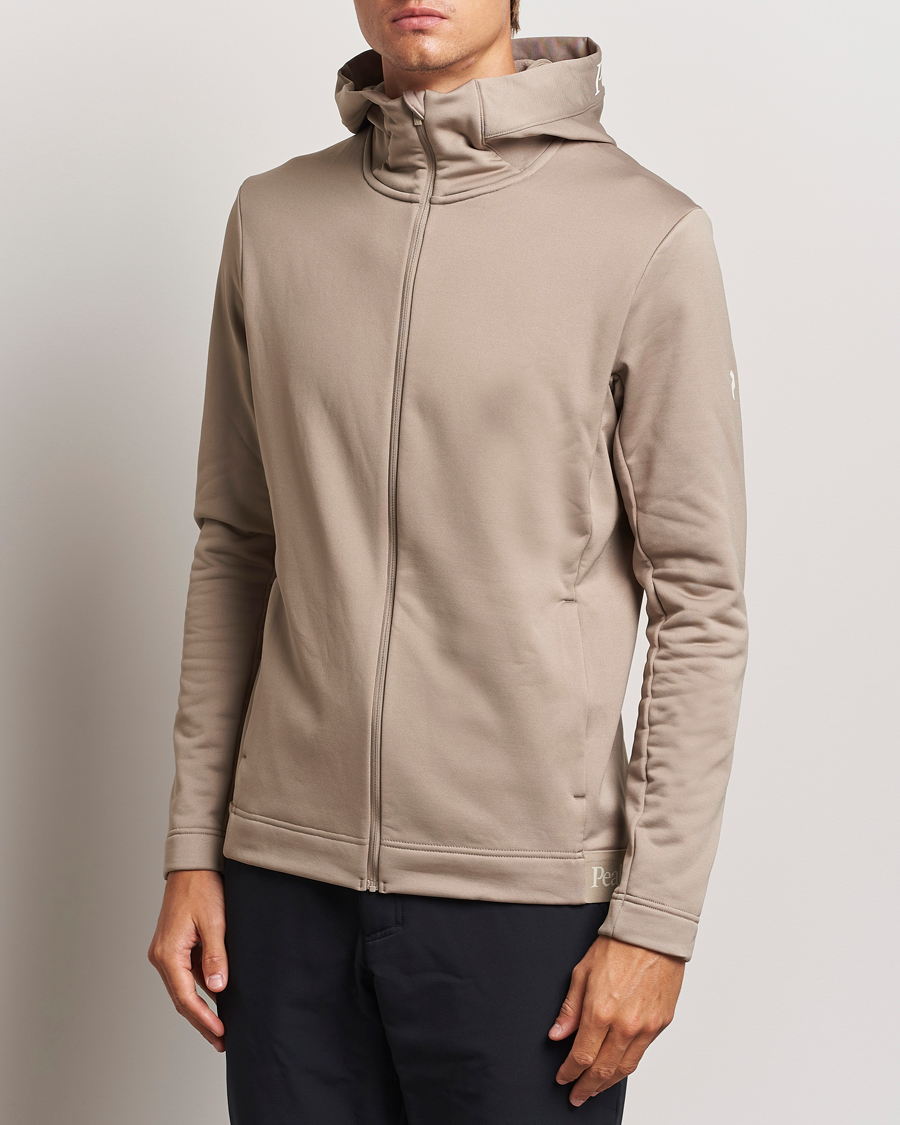 Hombres | Jerséis y prendas de punto | Peak Performance | Rider Tech Zip Hood Avid Beige