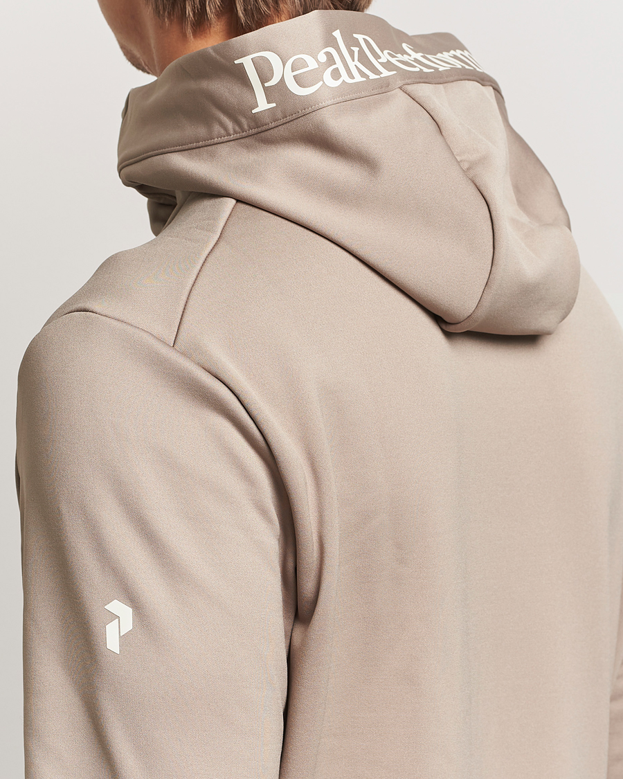 Hombres | Jerséis y prendas de punto | Peak Performance | Rider Tech Zip Hood Avid Beige