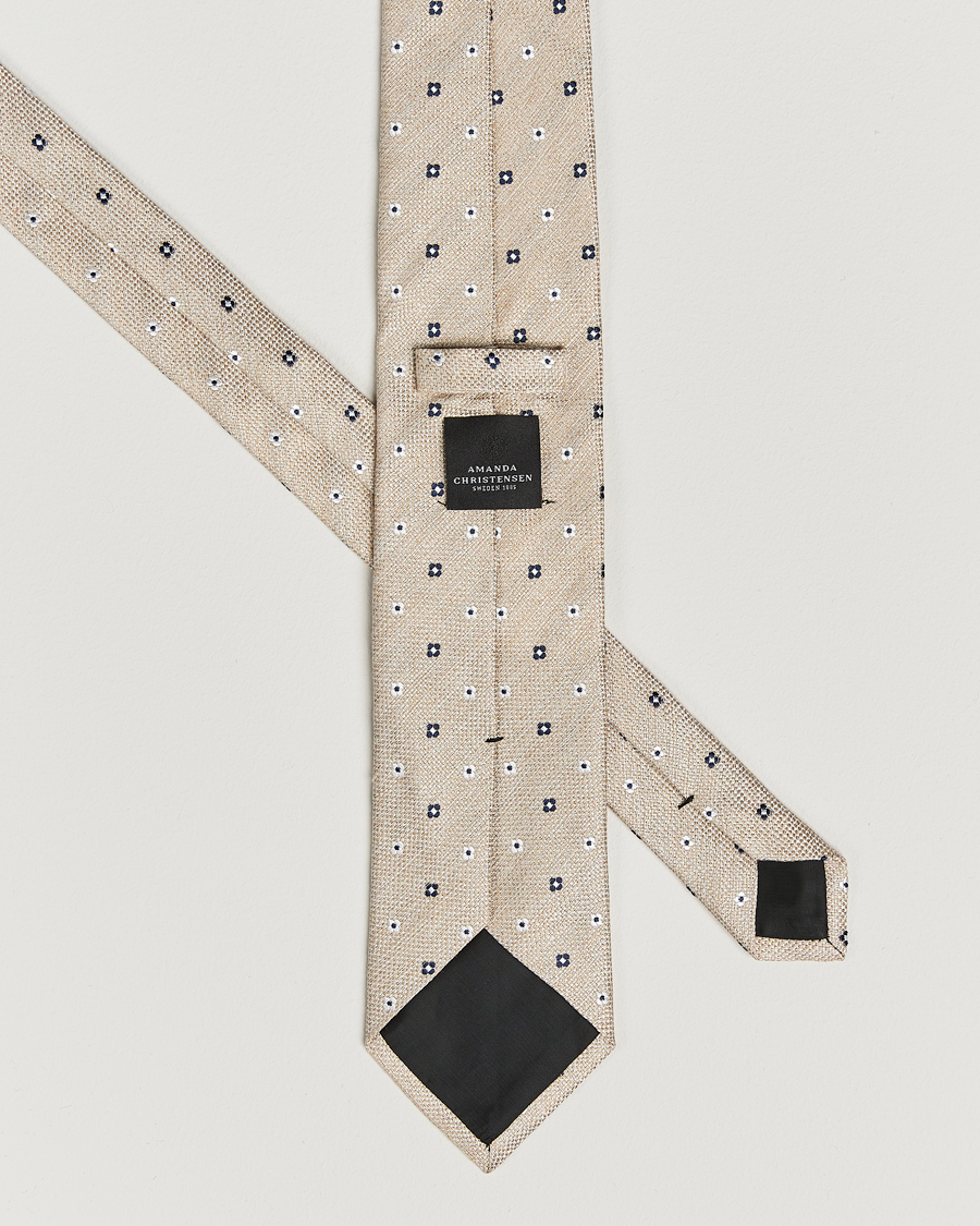 Hombres | Amanda Christensen Silk/Linen Printed Flower 8cm Tie Sand | Amanda Christensen | Silk/Linen Printed Flower 8cm Tie Sand