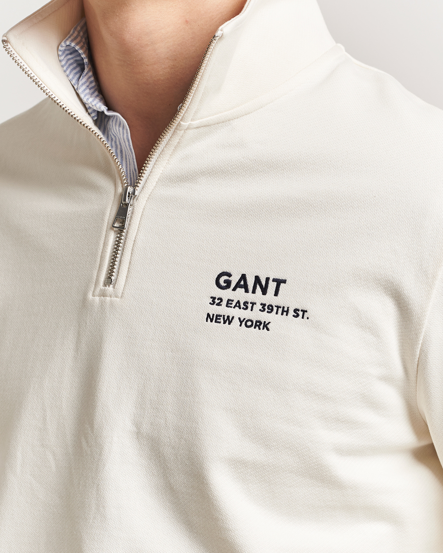 Hombres | Jerséis y prendas de punto | GANT | Script Graphic Half Zip Sweater Cream