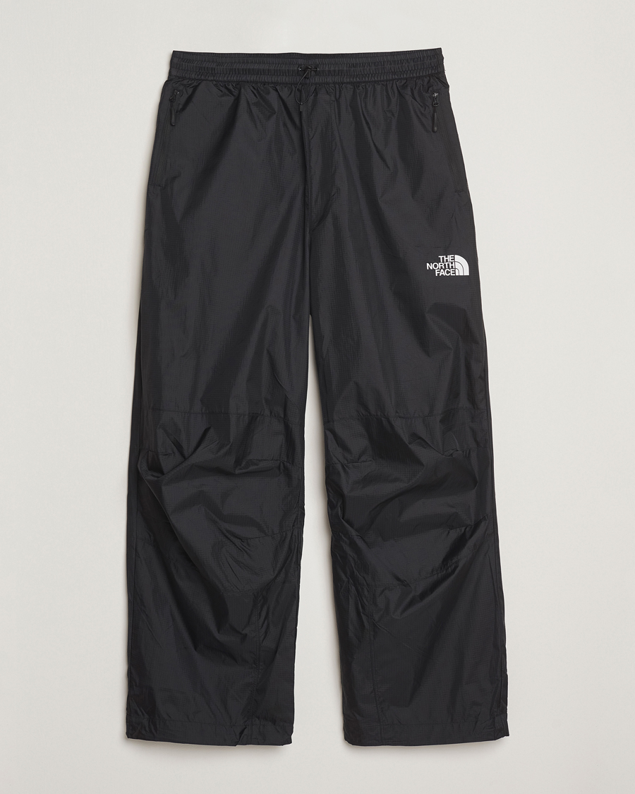 Hombres | Pantalones | The North Face | NSE Wind Track Pants Black