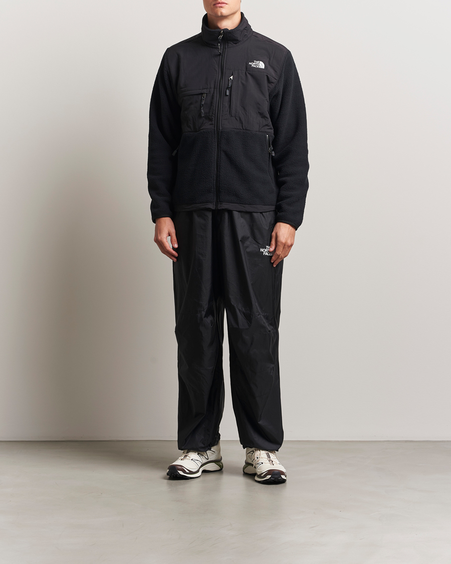 Hombres | Pantalones | The North Face | NSE Wind Track Pants Black