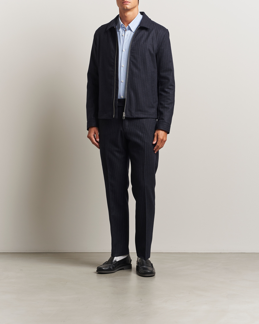 Hombres | Pantalones | Tiger of Sweden | Tense Wool Pleated Pinstriped Trousers Blue Function
