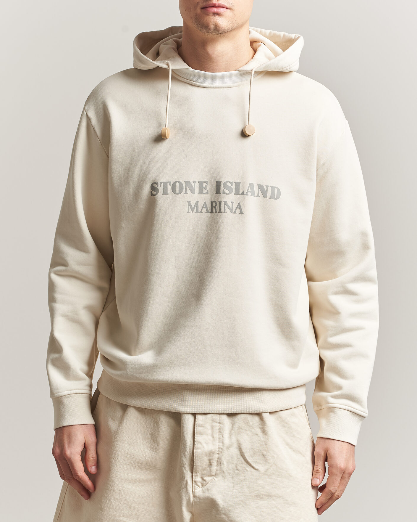 Hombres | Jerséis y prendas de punto | Stone Island | Marina Cotton Fleece Hood Ivory