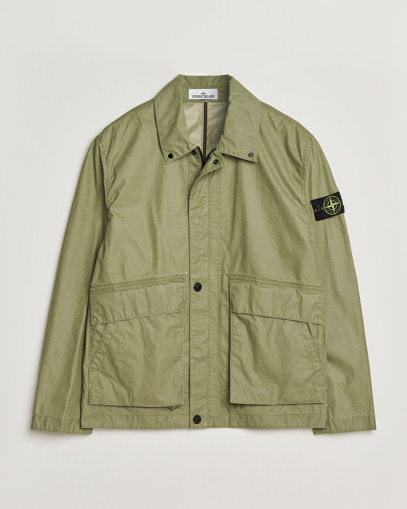 Hombres | Abrigos y chaquetas | Stone Island | Waxed Pigment Cotton Tela Coach Jacket Military Green