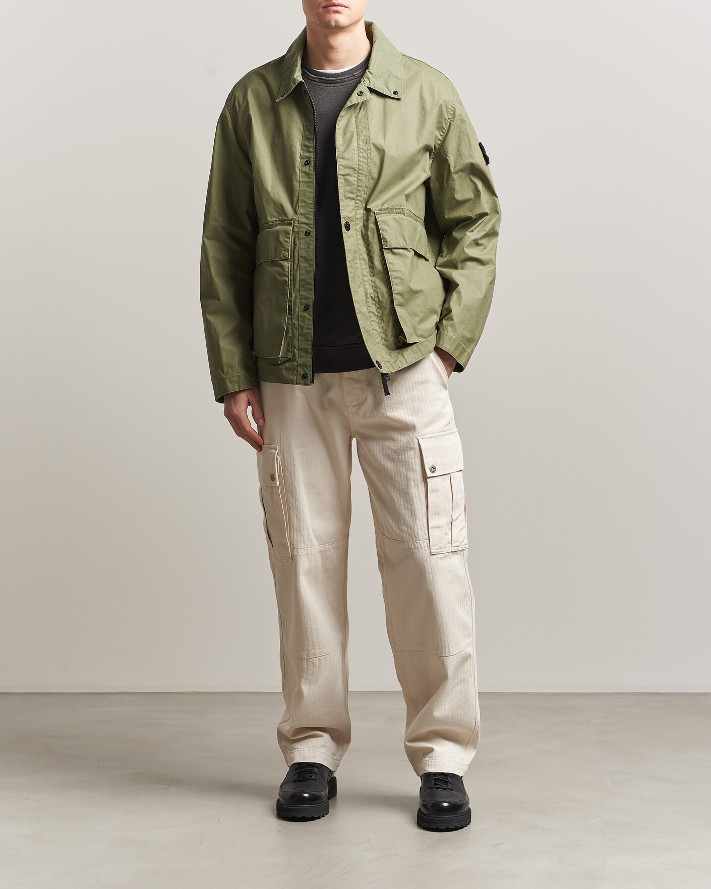 Hombres | Abrigos y chaquetas | Stone Island | Waxed Pigment Cotton Tela Coach Jacket Military Green