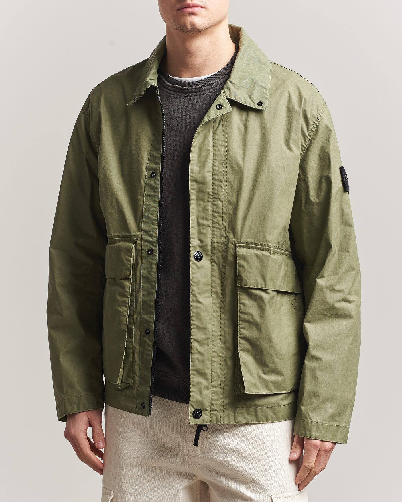Hombres | Abrigos y chaquetas | Stone Island | Waxed Pigment Cotton Tela Coach Jacket Military Green