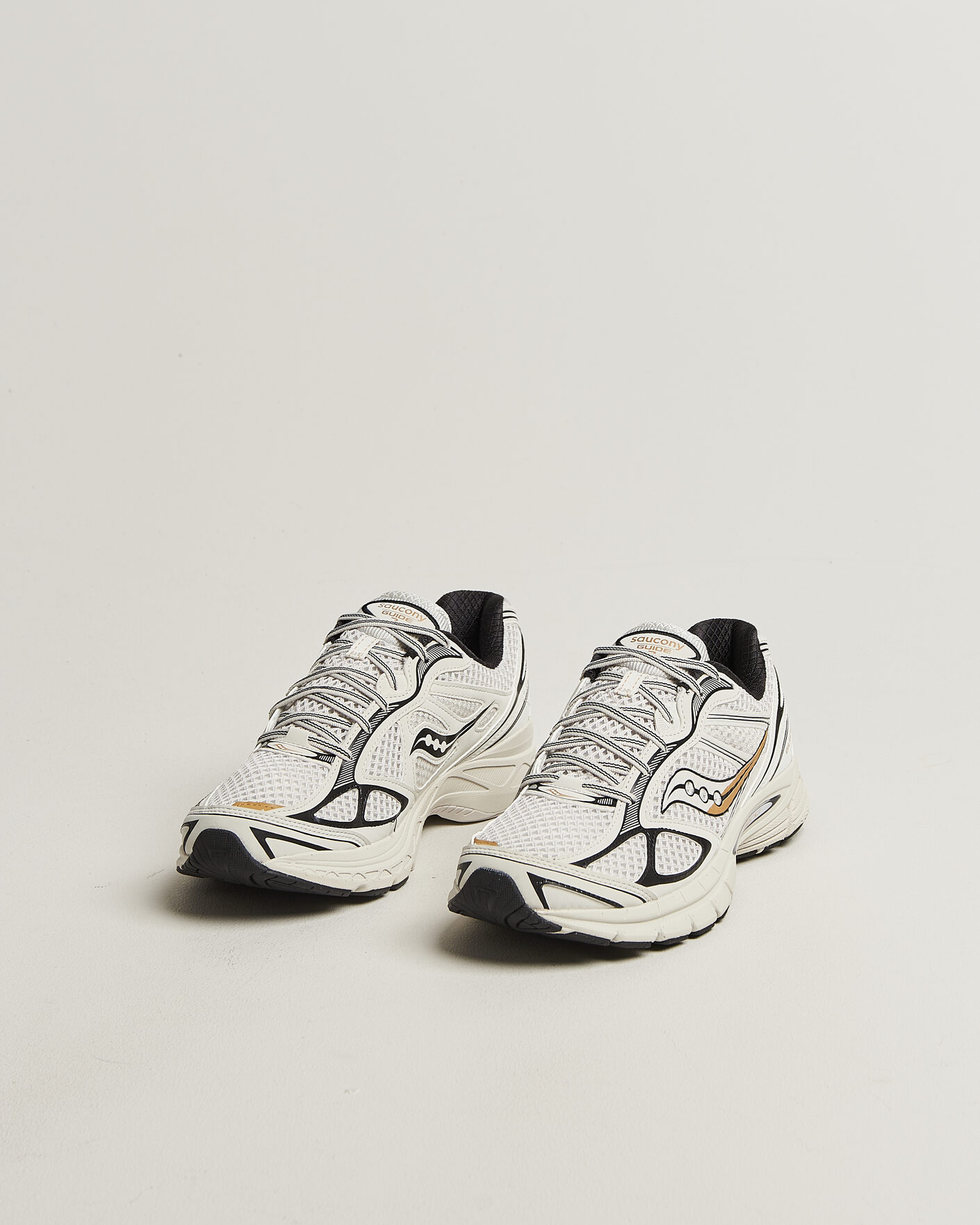 Hombres | Zapatillas | Saucony | Guide 7 Running Sneaker Onyx/Gold